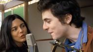 Monica Barbaro and Timothée Chalamet in A Complete Unknown | Image via Searchlight Pictures